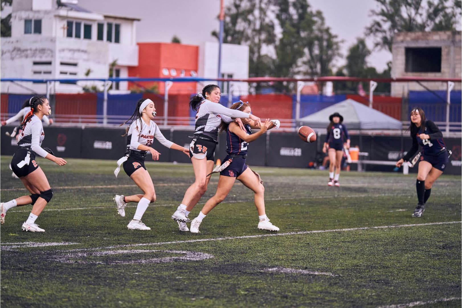 High school girls competing in flag football