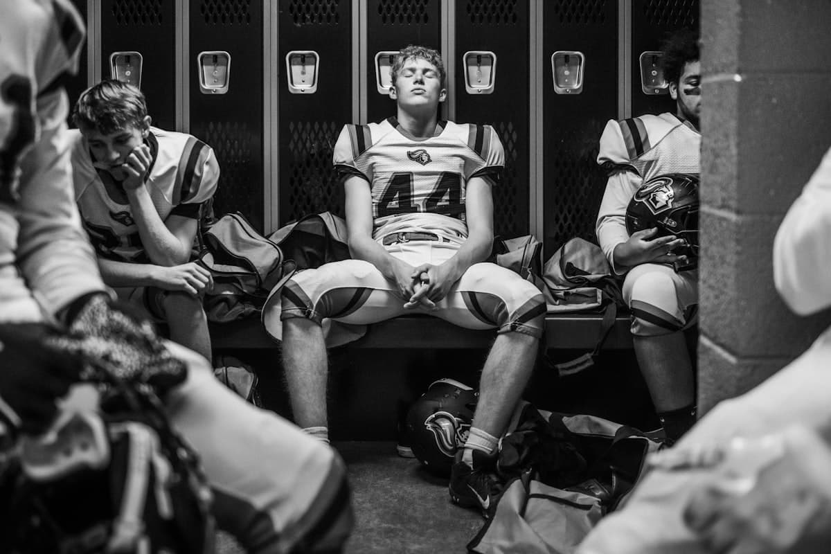 Football player in focused mental preparation before a game
